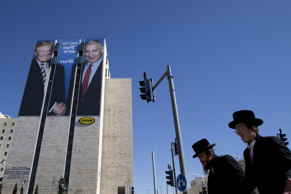 FILE - In this Feb. 4, 2019, file photo, an election campaign billboard shows Israeli Prime Minister Benjamin Netanyahu, right, and U.S. President Donald Trump in Jerusalem. Hebrew on the billboard reads: "Netanyahu is a different league." (AP Photo/Oded Balilty, File)