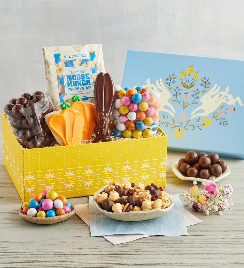 chocolate and bunny-shaped candy in easter basket