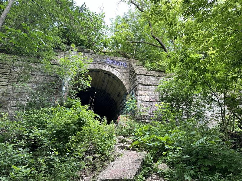 The Schlitz Brewery Ice House Tunnel, located in the Cambridge Heights neighborhood, is a bit of a historical mystery. One theory is that it was a tunnel for the brewery's carriages to access the river and ice houses in the area.