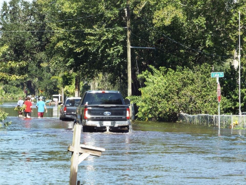 The aftermath of Tropical Storm Ian on Friday, Sept. 30, 2022, near Lake Drive in New Smyrna Beach. Homes flooded quickly once the storm arrived Thursday in the Ellison Avenue and Lake Shore neighborhood off of State Road 44. Water started coming into Brandy Gray LaFrance's Lake Drive home at 6 a.m. when she, her husband and six children found themselves in ankle-deep water. By 10 a.m., the water was knee-deep and kept rising, she said.