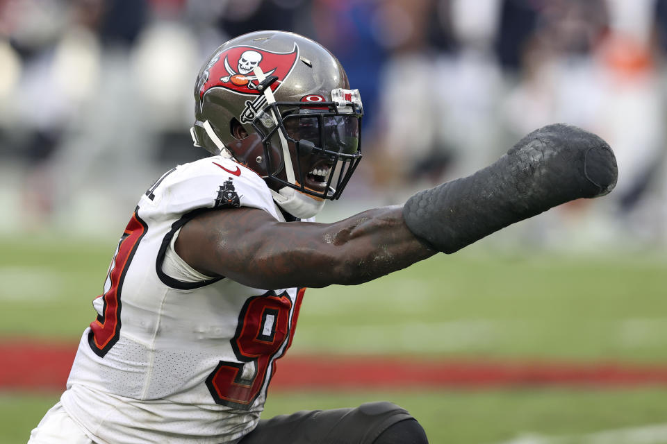 Tampa Bay Buccaneers outside linebacker Jason Pierre-Paul (90) celebrates after stopping Chicago Bears quarterback Justin Fields during the first half of an NFL football game Sunday, Oct. 24, 2021, in Tampa, Fla. (AP Photo/Mark LoMoglio)