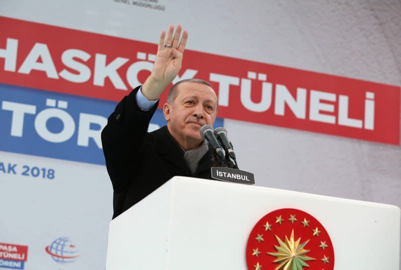 Turkish President Tayyip Erdogan greets his supporters during a ceremony in Istanbul, Turkey January 27, 2018. Yasin Bulbul/Presidential Palace/Handout via REUTERS