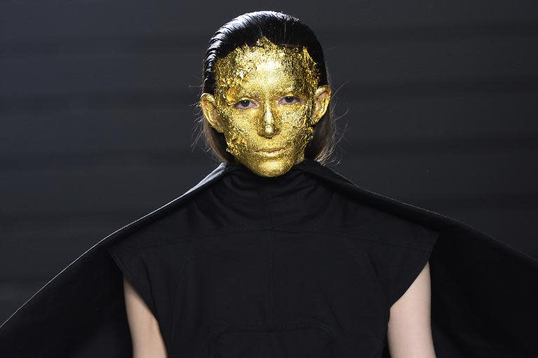 A model presents a creation by Rick Owens during the 2015-2016 fall/winter ready-to-wear collection fashion show on March 5, 2015 in Paris