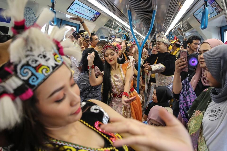 Participants take part in the ‘Keretapi Sarong’ event in conjunction with Malaysia Day in Kuala Lumpur September 16, 2019.