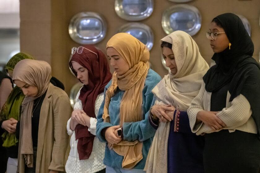 CLAREMONT, CA - APRIL 06: Muslim students and faculty staff offer Maghreb, evening prayers, after having a specially prepared halal meal for Muslim students fasting in the month of Ramadan, at Harvey Mudd College on Thursday, April 6, 2023 in Claremont, CA. (Irfan Khan / Los Angeles Times)