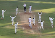 Cricket - India v England - Fourth Test cricket match - Wankhede Stadium, Mumbai, India - 11/12/16. India's players celebrate the wicket of England's Jake Ball. REUTERS/Danish Siddiqui