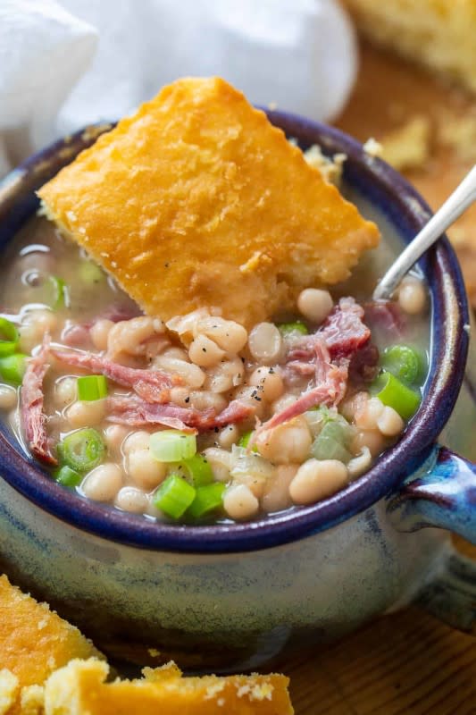 <p>Casserole Crissy</p><p>It may be basic but it's not boring and making this classic dish in your slow cooker makes it even easier.</p><p><strong>Get the recipe: <a href="https://casserolecrissy.com/crock-pot-ham-and-beans/" rel="nofollow noopener" target="_blank" data-ylk="slk:Crock Pot Ham and Beans;elm:context_link;itc:0;sec:content-canvas" class="link rapid-noclick-resp">Crock Pot Ham and Beans</a></strong></p><p><strong>Related: <a href="https://parade.com/930543/kristamarshall/slow-cooker-soup-recipes-for-fall-winter/" rel="nofollow noopener" target="_blank" data-ylk="slk:65 Crock Pot Soup Recipes;elm:context_link;itc:0;sec:content-canvas" class="link rapid-noclick-resp">65 Crock Pot Soup Recipes</a></strong></p>