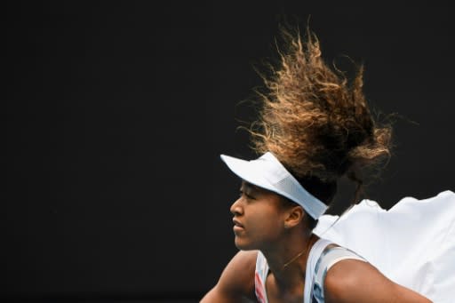 Japan's Naomi Osaka launches serve against Czech Republic's Marie Bouzkova -- one sizzler at 183 kph (114mph) managed to break the net