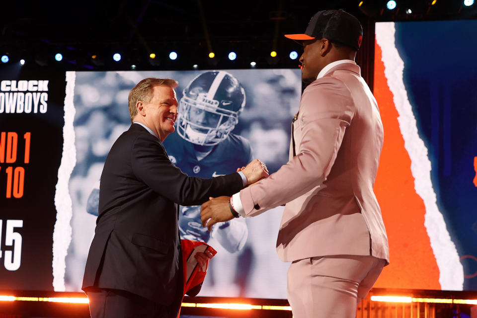 Patrick Surtain II greets NFL Commissioner Roger Goodell onstage after being selected ninth by the Denver Broncos. (Photo by Gregory Shamus/Getty Images)