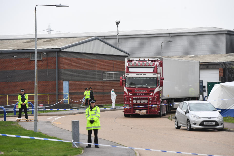 Police activity at the Waterglade Industrial Park in Grays, Essex, after 39 bodies were found inside a lorry on the industrial estate. PA Photo. Picture date: Wednesday October 23, 2019. Early indications suggest there 38 are adults and one teenager, police said. The lorry is from Bulgaria and entered the country at Holyhead, North Wales, one of the main port for ferries from Ireland. See PA story POLICE Container. Photo credit should read: Stefan Rousseau/PA Wire