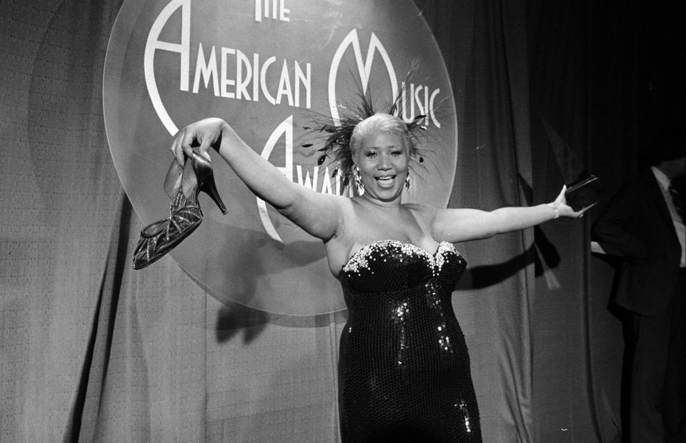 <p>Aretha Franklin wears a strapless black sequin gown with crystals along the bust at the American Music Awards. (Photo by The LIFE Picture Collection/Getty Images) </p>