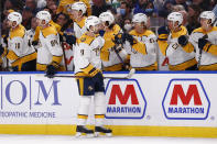 Nashville Predators left wing Filip Forsberg (9) celebrates his goal during the first period of an NHL hockey game against the Buffalo Sabres, Friday, April 1, 2022, in Buffalo, N.Y. (AP Photo/Jeffrey T. Barnes)