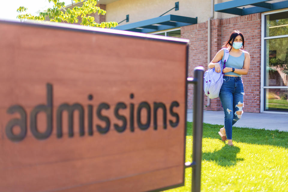 Student visiting the admissions office at a community college