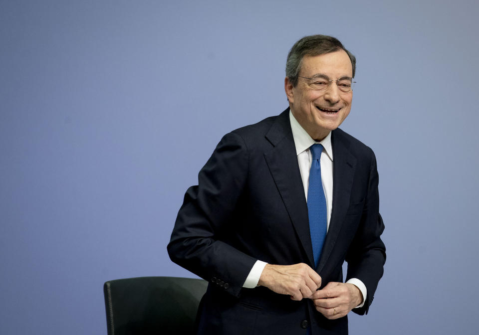 President of European Central Bank Mario Draghi stands up on the podium after a press conference after chairing his last policy meeting in Frankfurt, Germany, Thursday, Oct. 24, 2019. (AP Photo/Michael Probst)