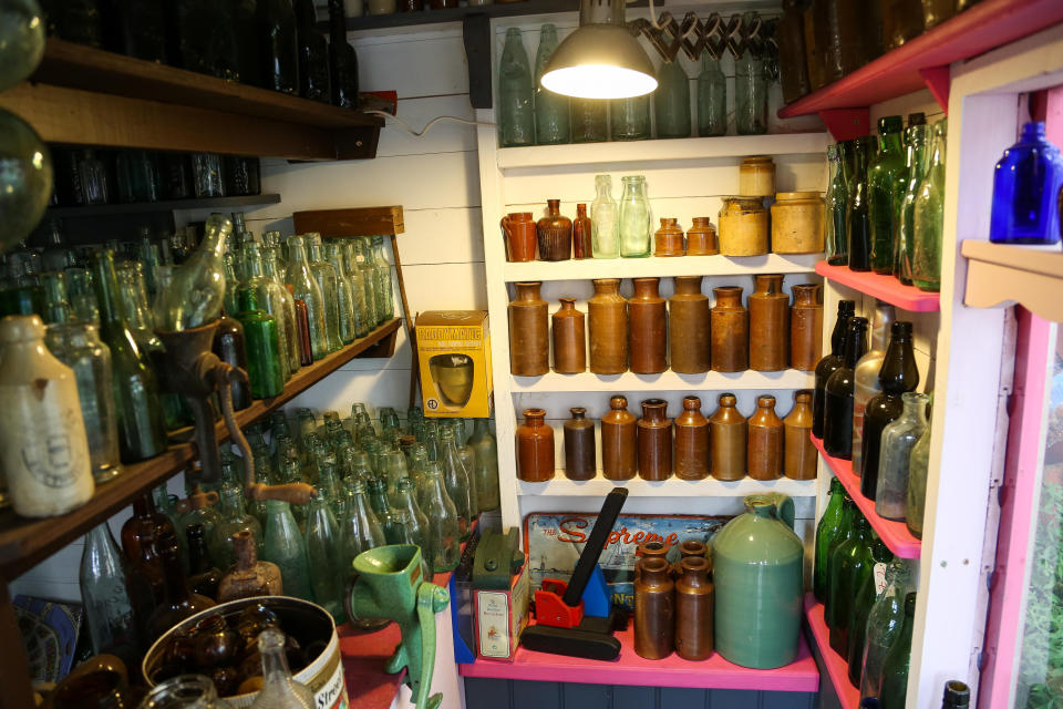 A seven-year-old schoolgirl is raking in hundreds of pounds by selling antique bottles from a little shop in her back garden - after digging them up from old landfill sites. Betsy-Mae Lloyd has been coining it in after launching her own business at her parents' home while still attending primary school.  The young entrepreneur flogs old bottles, jars and teapots - dating back to between the 1870s and 1930 - which she finds on historic landfill sites in the West Midlands.  After taking them home and cleaning them up herself, she then stores them in a Victorian-style play shed, built by dad Jason, before listing them for sale on Facebook. 