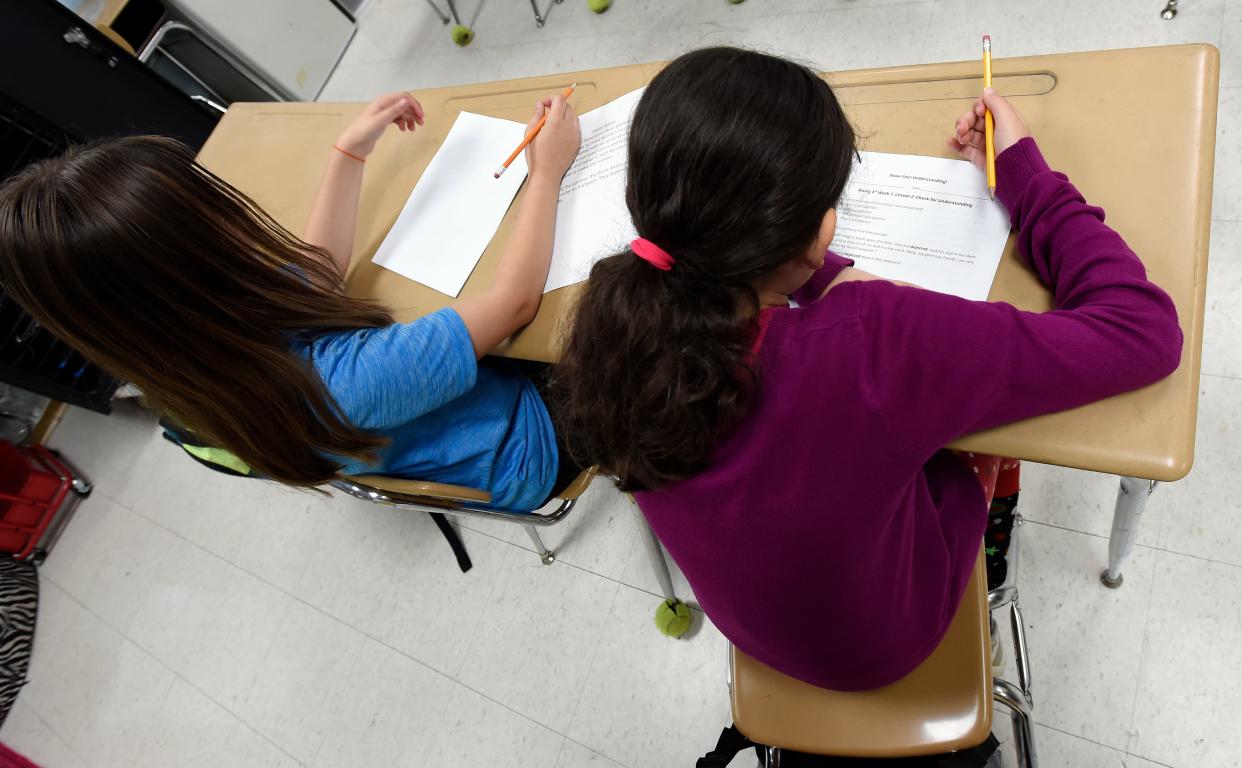 Third grade students work on an English language arts assignment at Dodson Elementary School on June 6 in Nashville. The students were part of Promising Scholars, the Metro Nashville Public Schools summer program.