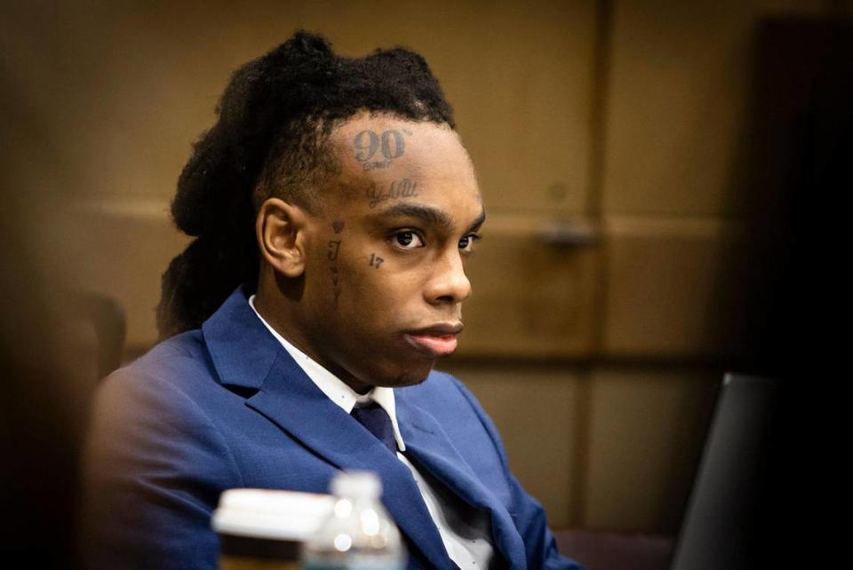 Fort Lauderdale, Florida - June 9, 2023 - Jamell Maurice Demons, known professionally as YNW Melly, listens intently during opening statements at murder trial in a Fort Lauderdale court.