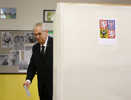 Czech President Milos Zeman casts his vote in parliamentary elections at a polling station in Prague, Czech Republic October 20, 2017. REUTERS/David W Cerny