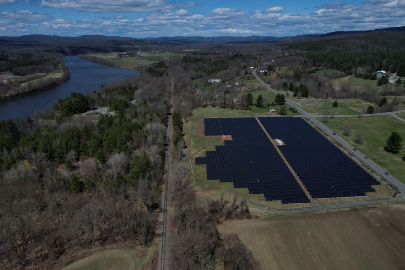 FILE PHOTO: Solar panels are arrayed on Earth Day in Northfield