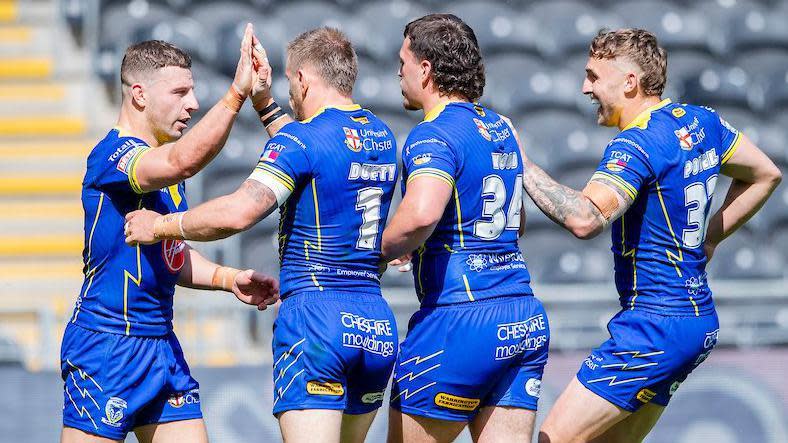 Rugby League - Betfred Super League Round 15 - Hull FC v Warrington Wolves - MKM Stadium, Kingston upon Hull, England - Warrington's Matt Dufty is congratulated by George WIlliams on scoring a try against Hull FC.