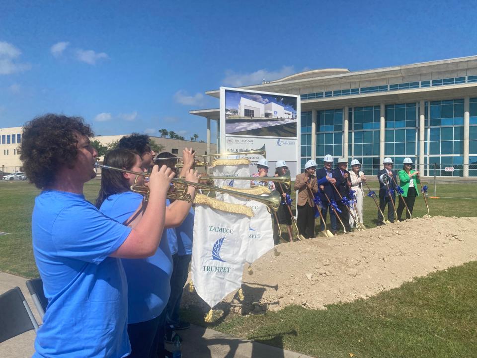 Texas A&M University-Corpus Christi student trumpet players perform as university officials break ground on a new art and media building Wednesday.