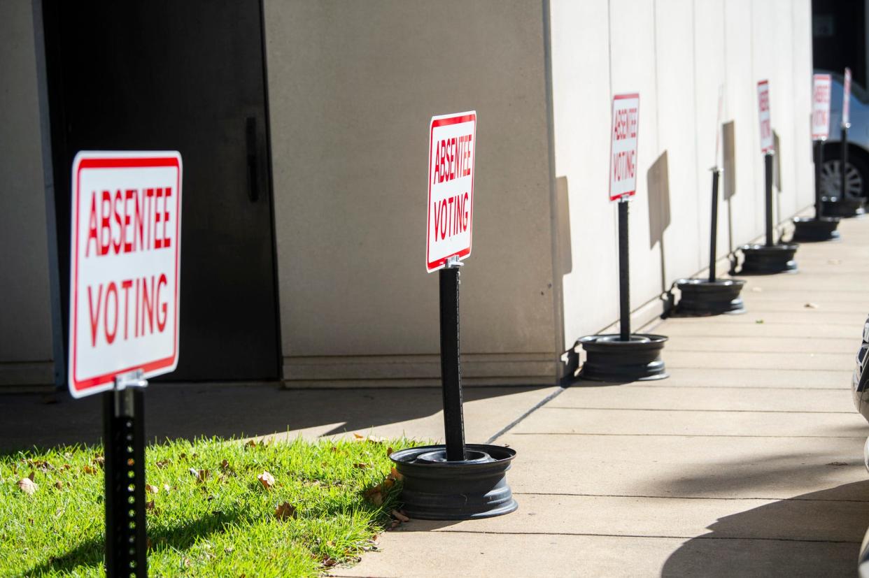 Signs direct to the absentee voting office outside the Montgomery County Courthouse in Montgomery, Ala., on Wednesday, Sept. 30, 2020. Three new bills filed for the 2024 session would change the absentee ballot process.