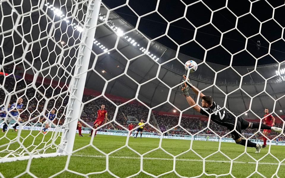 Japan's Ritsu Doan scores his side's opening goal during the World Cup group E soccer match - AP