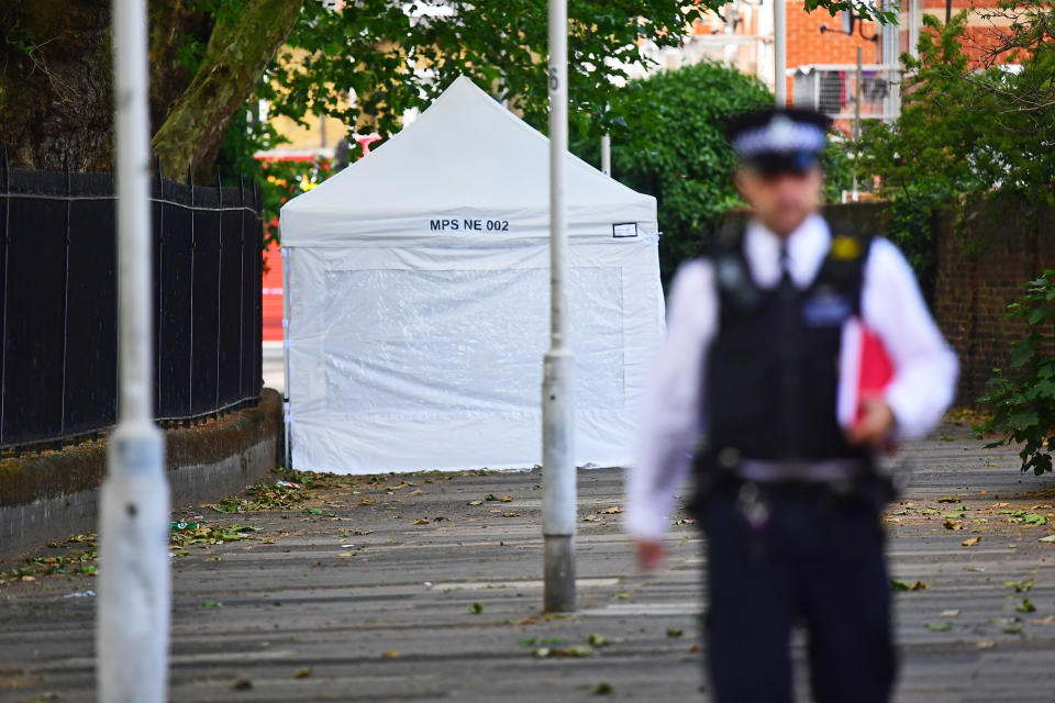 A police forensic tent in West Ham, east London, where detectives have launched a murder inquiry after a man in his 40s, was stabbed to death in Whalebone Lane, Stratford, in the early hours of Monday.