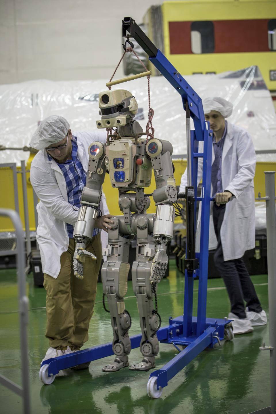 In this photo taken on Friday, July 26, 2019, and distributed by Roscosmos Space Agency Press Service, the Fedor robot is displayed before being loaded into a Soyuz capsule that was launched Thursday Aug. 22, 2019, from the launch pad at Russia's space facility in Baikonur, Kazakhstan. A Russian space capsule carrying a humanoid robot has failed to dock as planned with the International Space Station. A statement from the Russian space agency Roscosmos said the failure to dock on Saturday Aug. 24, 2019, was because of problems in the docking system, but didn't give details. (Roscosmos Space Agency Press Service photo via AP)