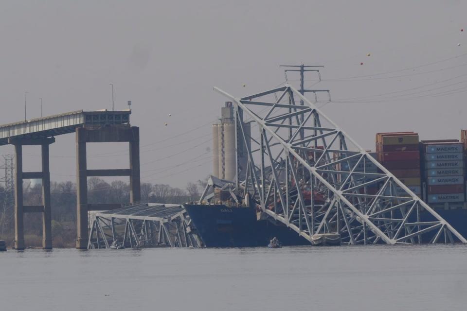 The container ship Dali rests against wreckage of the Francis Scott Key Bridge (Copyright 2024 The Associated Press. All rights reserved.)