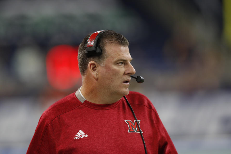 Miami of Ohio head coach Chuck Martin watches during the first half of the Mid-American Conference championship NCAA college football game against Central Michigan, Saturday, Dec. 7, 2019, in Detroit. (AP Photo/Carlos Osorio)