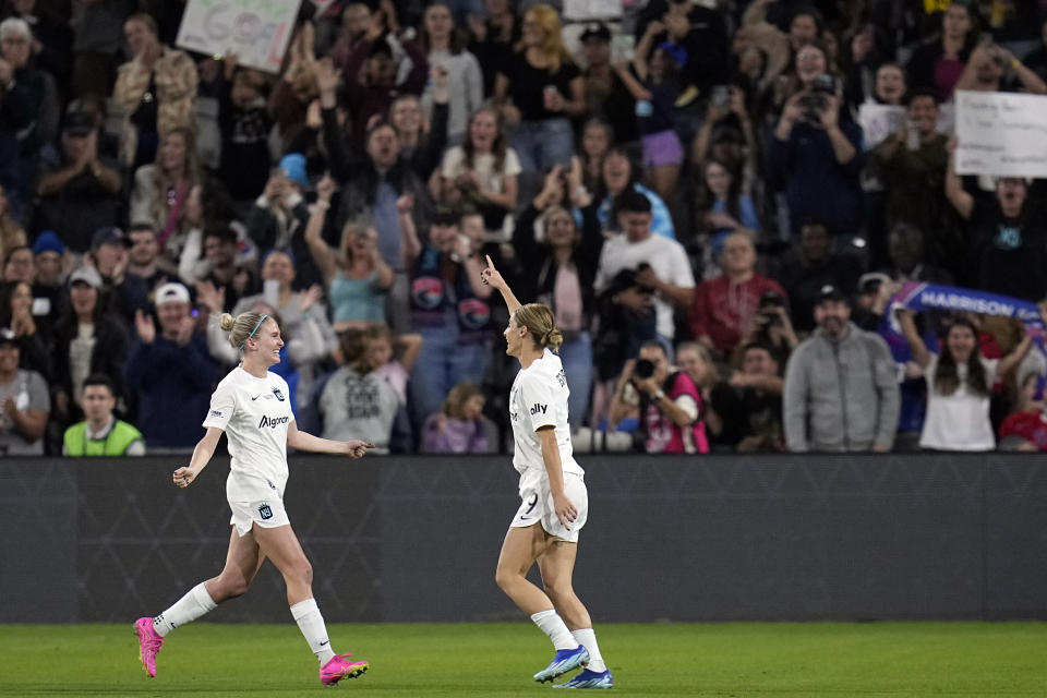 NJ/NY Gotham forward Esther Gonzalez, right, celebrates with teammate forward Jenna Nighswonger after scoring a goal during the first half of the NWSL Championship soccer game against OL Reign, Saturday, Nov. 11, 2023, in San Diego. (AP Photo/Gregory Bull)