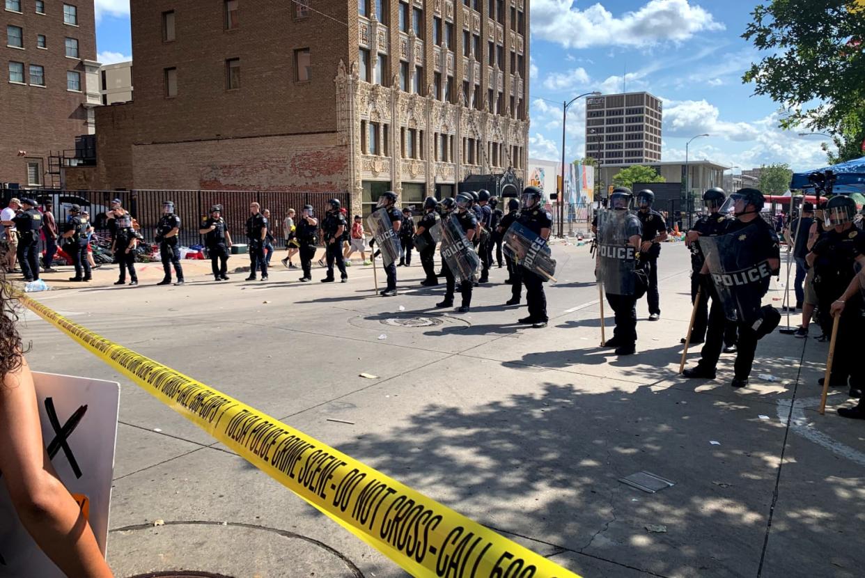 Image: Police form a line outside of the BOK Center before a rally hosted by President Donald Trump in Tulsa, Okla., on June 20, 2020. (Lauren Egan / NBC News)