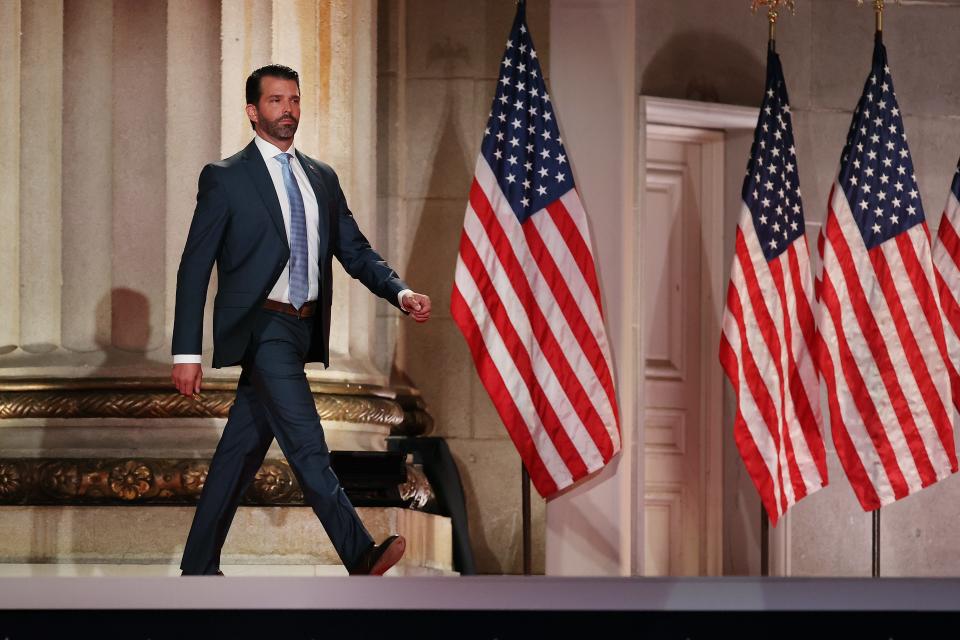 Donald Trump Jr. steps out on stage before prerecording his address to the Republican National Convention at the Mellon Auditorium in Washington, D.C.