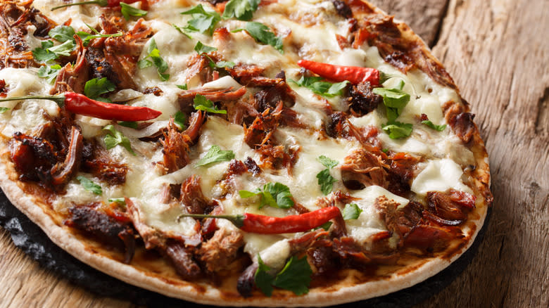 Pulled pork pizza with toppings