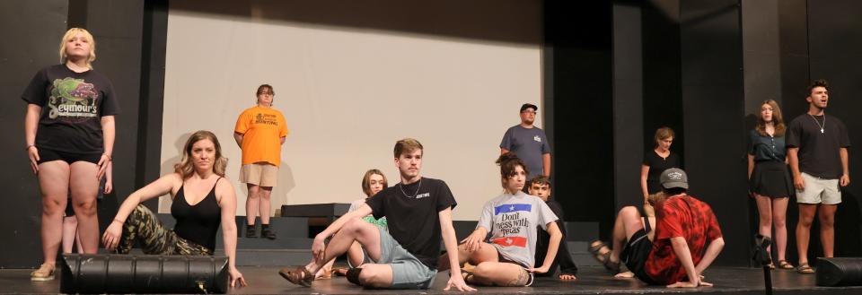 The ensemble of New Castle Playhouse's 'Children of Eden' rehearse.