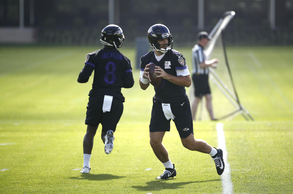 The Ravens are reportedly tinkering with a two-QB misdirection offense that would see Joe Flacco and Lamar Jackson on the field at the same time. (AP)