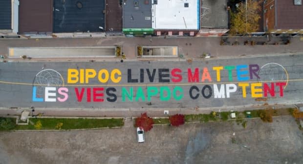 Black Lives Matter Sudbury created this mural on Elgin Street in downtown Sudbury last year. (Supplied/Black Lives Matter Sudbury - image credit)