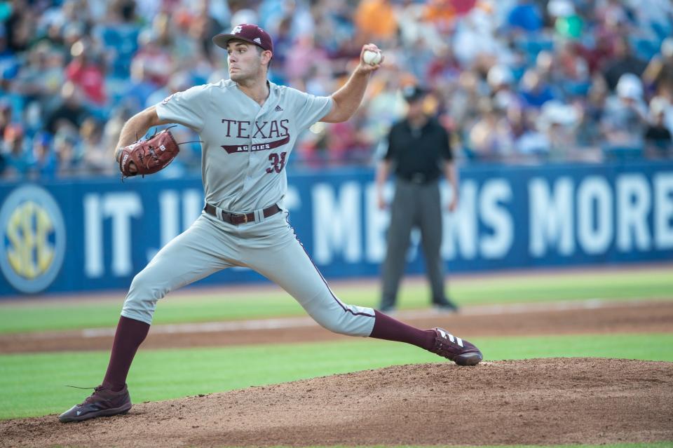 Texas A&M pitcher Jacob Palisch (33) pitches as Alabama Crimson Tide takes on Texas A&M Aggies during the SEC baseball tournament at the Hoover Metropolitan Stadium in Hoover, Ala., on Friday, May 27, 2022.