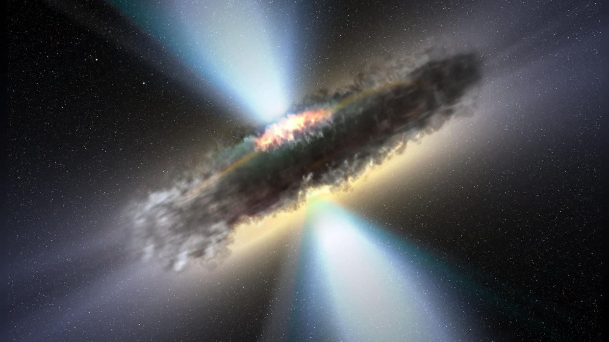  An illustration of a torus of dust hiding a feeding supermassive black hole. 