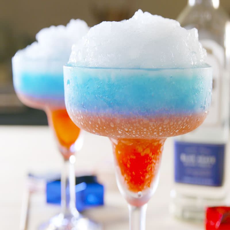 <p>Pro tip: The thicker you make your yummy margarita mixture, the easier it will be to get your red, white, and blue layers. </p><p><em><strong>Get the recipe at <a href="https://www.delish.com/cooking/a22019442/red-white-and-boozy-margaritas-recipe/" rel="nofollow noopener" target="_blank" data-ylk="slk:Delish;elm:context_link;itc:0;sec:content-canvas" class="link ">Delish</a>.</strong></em></p>
