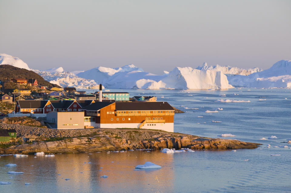 Colourful houses in Illulisat on Greenland Ilulissat is a UNESCO World Heritage Site because of the Jacobshavn Glacier or Sermeq Kujalleq which is the largest glacier outside Antarctica Photo: Ashley Cooper/Construction Photography/Avalon/Getty Images