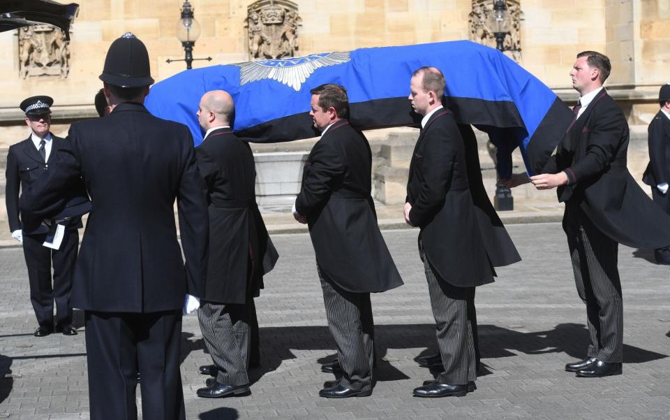 The coffin of Pc Keith Palmer passes a police guard of honour  - Credit: Paul Grover for The Telegraph