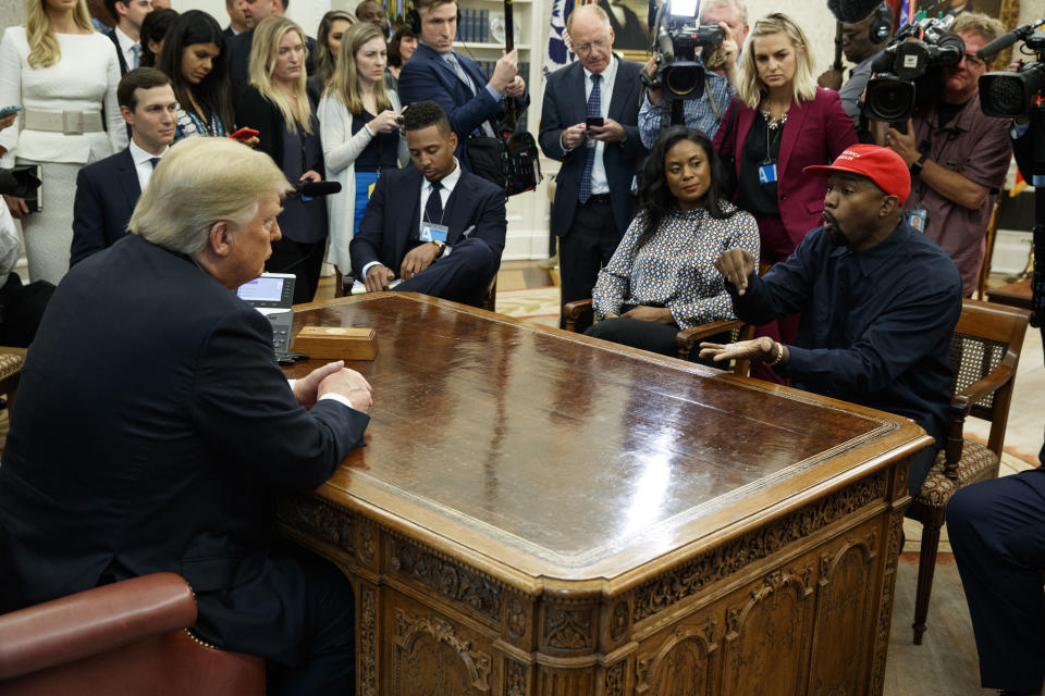 Rapper Kanye West speaks during a meeting with President Donald Trump in the Oval Office of the White House, Thursday, Oct. 11, 2018, in Washington. At left is White House Senior Adviser Jared Kushner. (AP Photo/Evan Vucci)