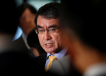 Japanese Foreign Minister Taro Kono speaks to media after a meeting with South Korean ambassador to Japan Lee Su-hoon (not pictured) at the Foreign Ministry in Tokyo, Japan October 30, 2018. REUTERS/Issei Kato