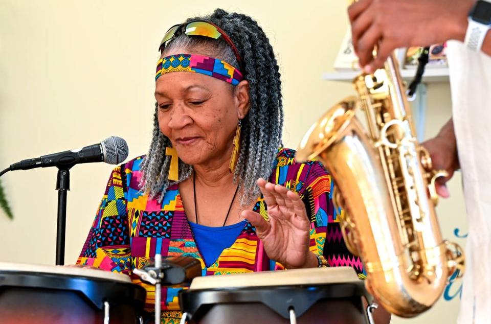 Dubshak Band percussionist Sandra Jarrett rehearses with the band on Oct. 18 in Warner Robins.