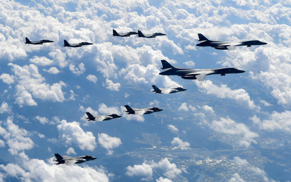 FILE - In this Sept. 18, 2017, file photo provided by South Korea Defense Ministry, U.S. Air Force B-1B bombers, F-35B stealth fighter jets and South Korean F-15K fighter jets fly over the Korean Peninsula during joint drills. Ahead of the second summit between U.S. President Donald Trump and North Korean leader Kim Jong Un, some observers say there is an uncertainty over the future of the decades-long military alliance between Washington and Seoul. (South Korea Defense Ministry via AP, File)