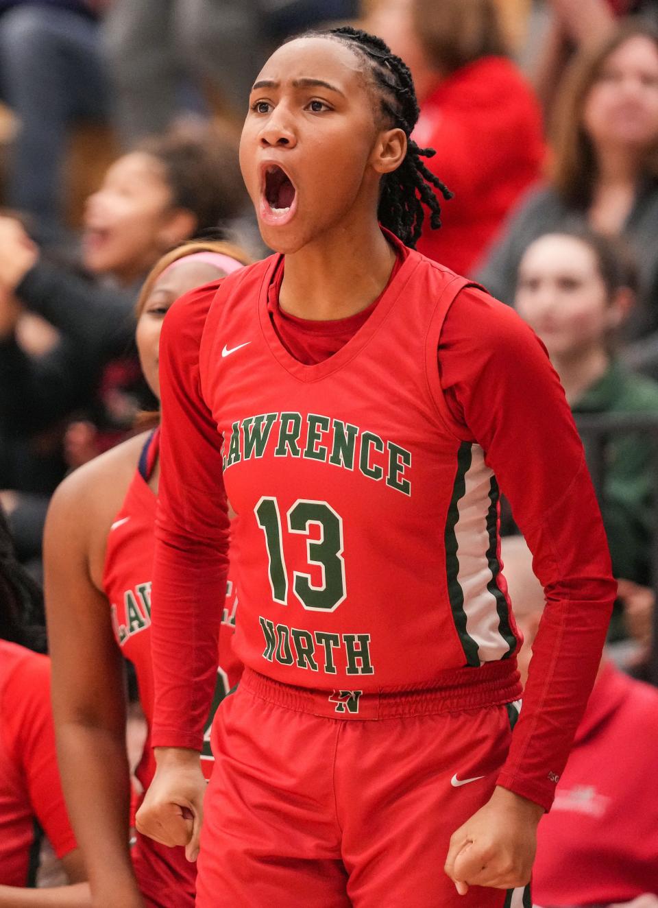 Lawrence North Wildcats Naja Winston (13) yells in excitement Thursday, Dec. 7, 2023, during the game at Lawrence Central High School in Indianapolis. The Lawrence Central Bears defeated the Lawrence North Wildcats, 57-55.