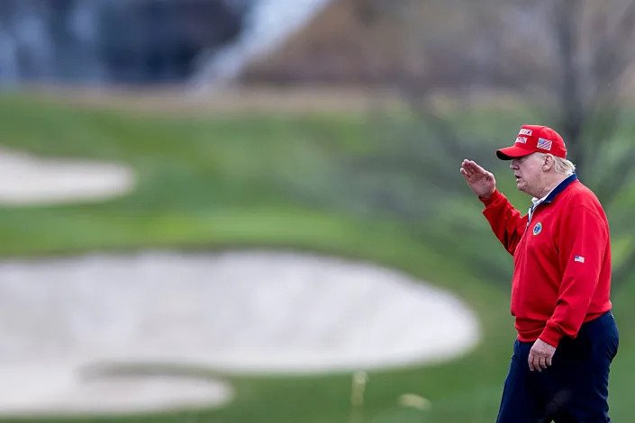 Then-President Donald Trump walks to Marine One at Trump National Golf Club on November 27, 2020 in Sterling, Virginia.