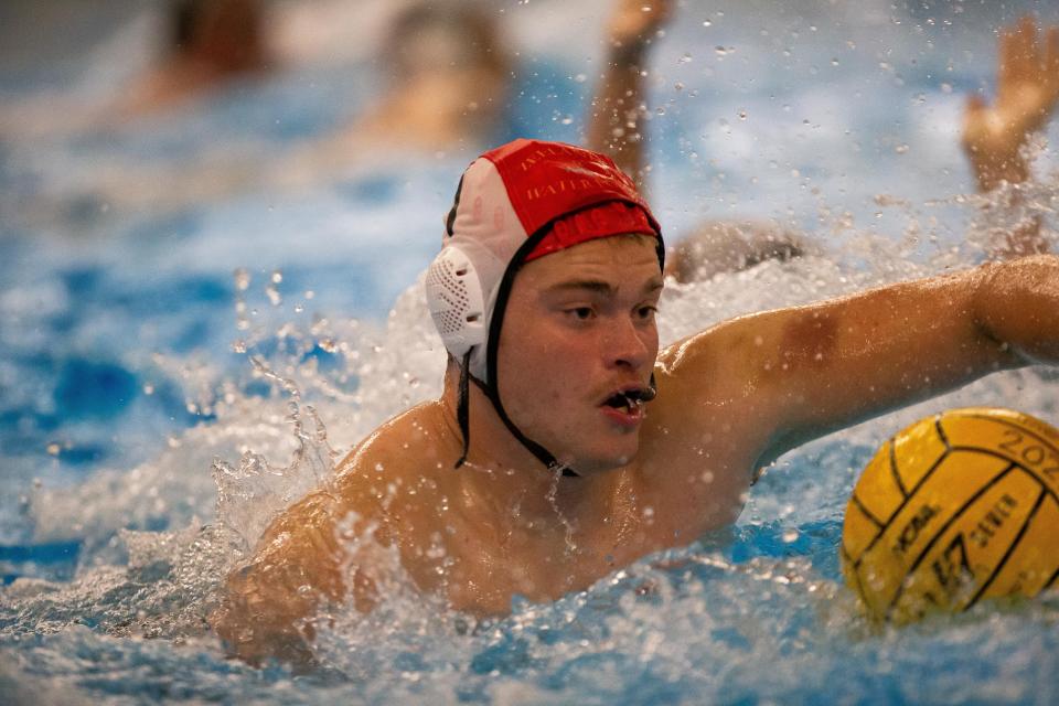 Zeeland water polo goalie Keaton Draeger gets to the ball in a match against West Ottawa on Sept. 27, 2023, at West Ottawa.